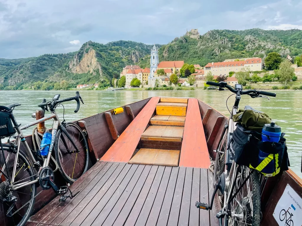 Two Backroads bikes loaded onto a boat on the water.