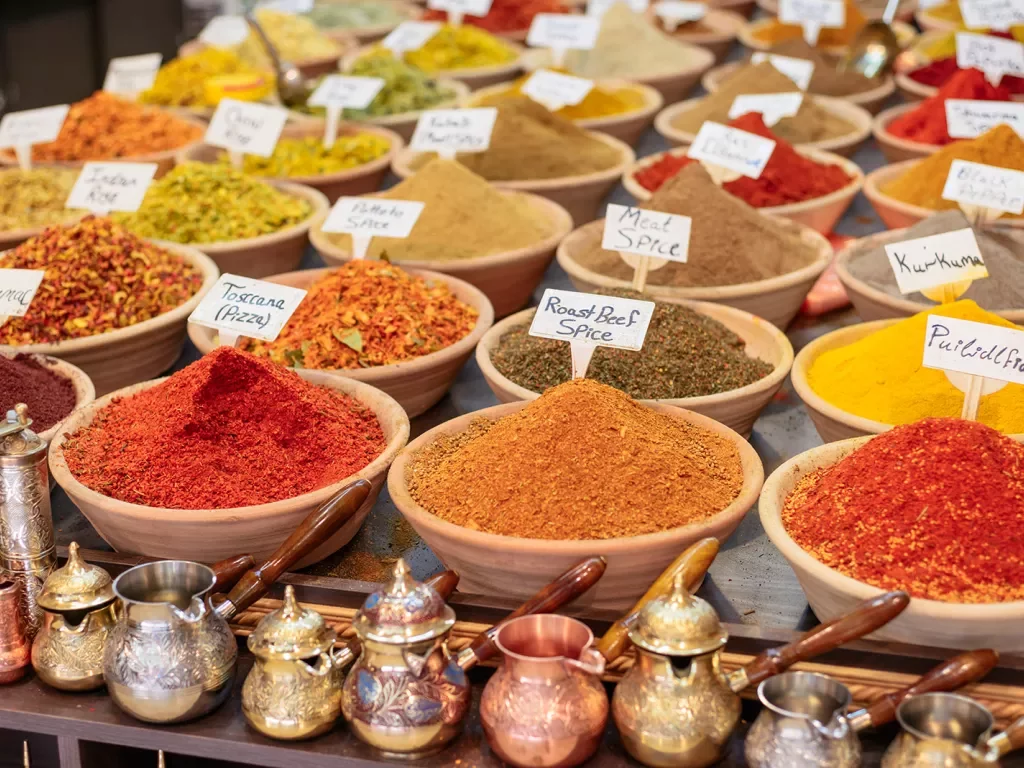 Table of spices at market
