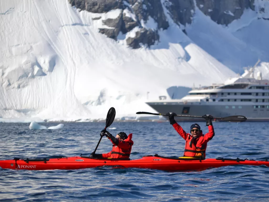 Kayakers in the icy waters of Antarctica