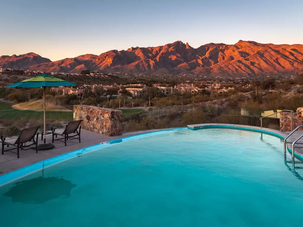 Pool shot AZ at sunset with mountain landscape