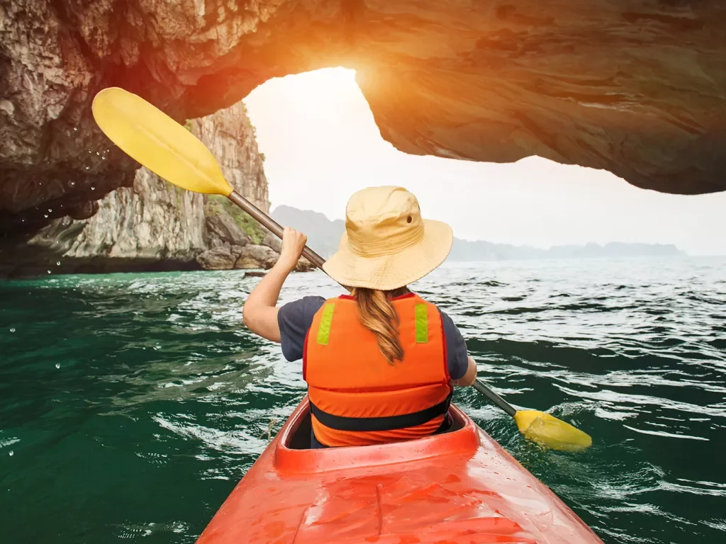 Kayaking among stone arches and cliffs in Vietnam