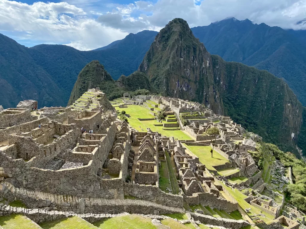 Wide shot of Machu Picchu ruins.