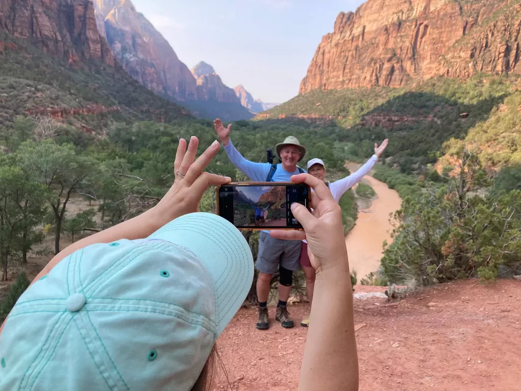 Guests getting photo taken in Zion