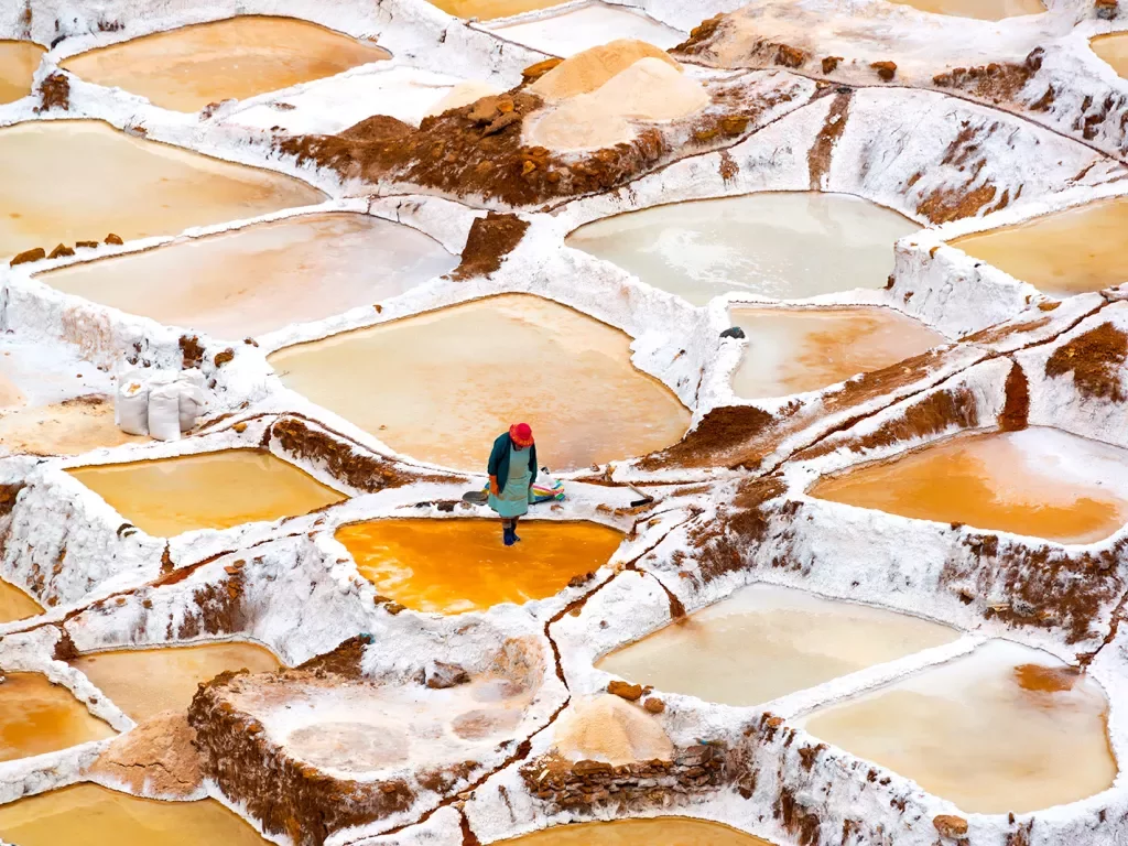 Local amid salt beds, red clay water.