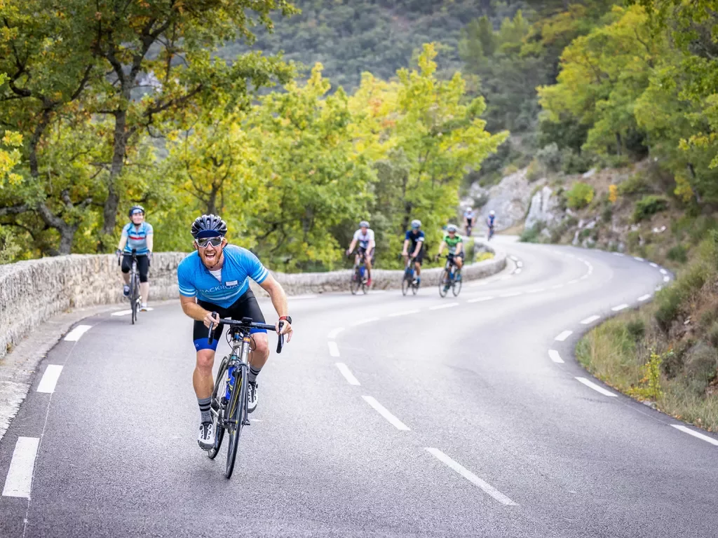 Backroads bikers riding up a hill in France