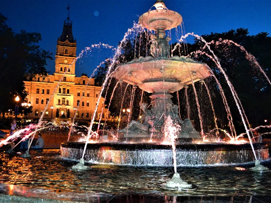Large fountain instillation at night.