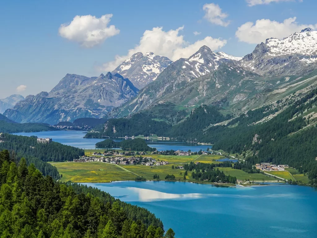 Mountain valley surrounded by lakes in the Alps.