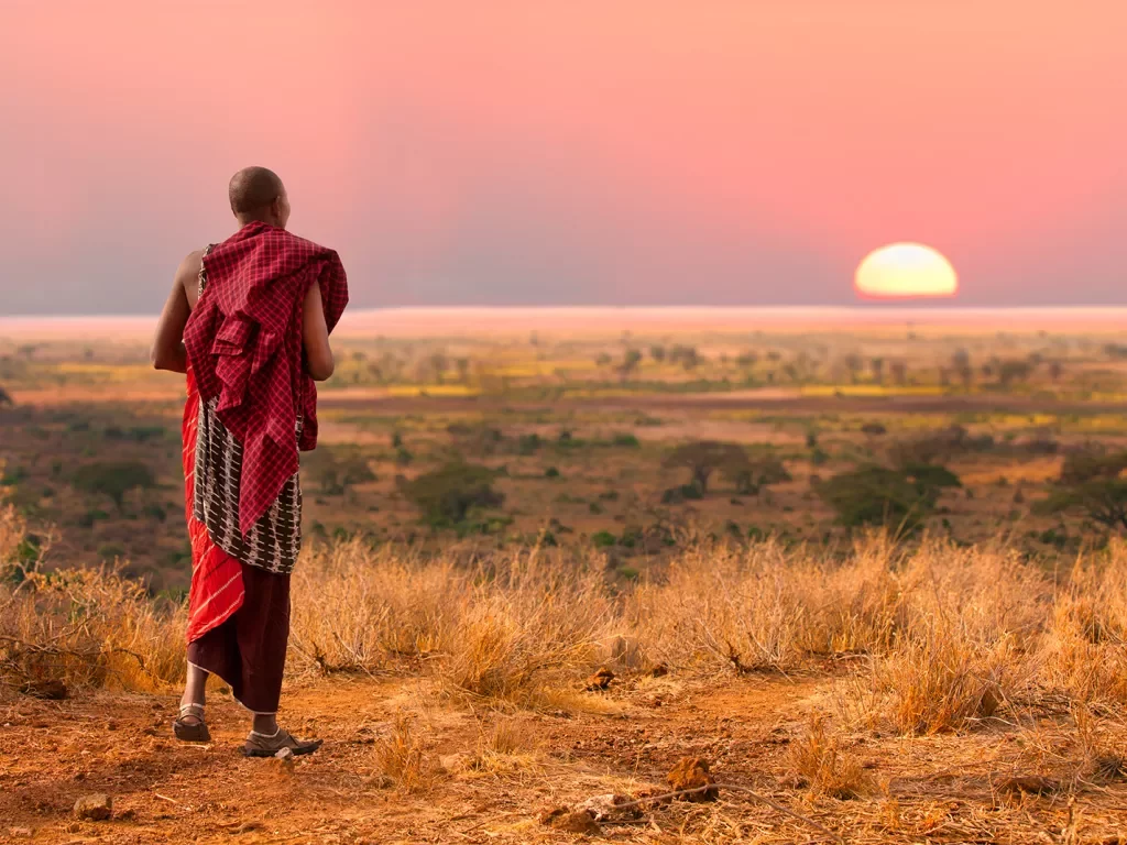 Masai looking at the sunset in Tanzania