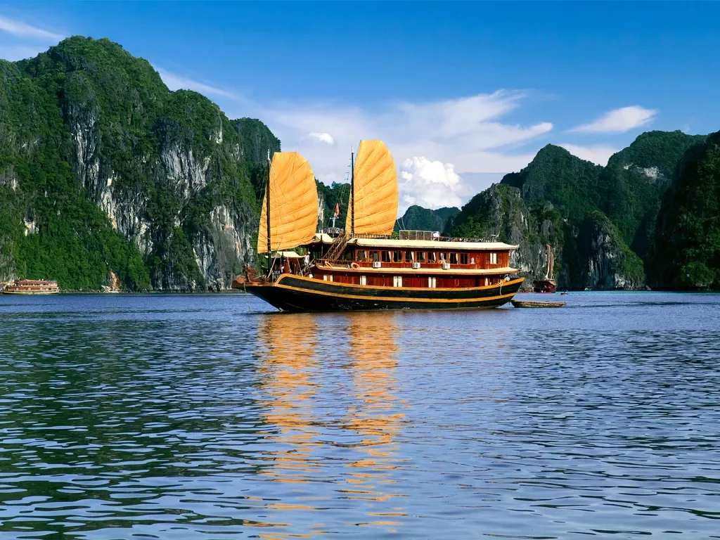 Barge sailing through Halong Bay in Vietnam
