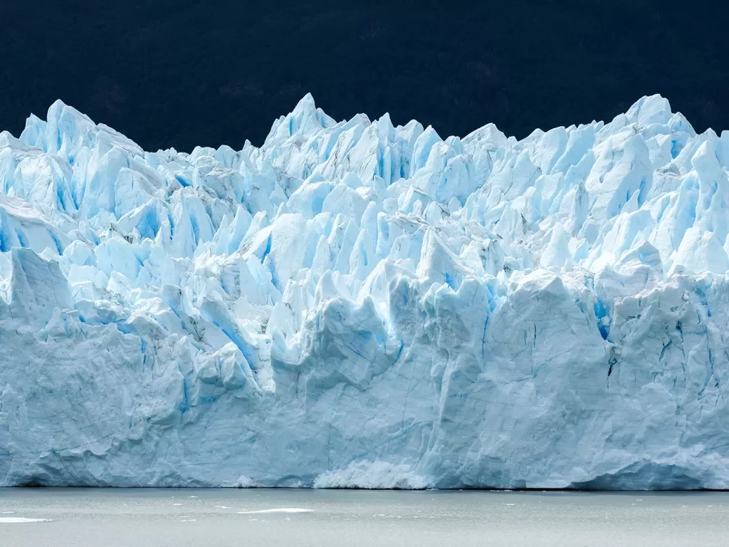 Wide shot of spike-topped glacier.