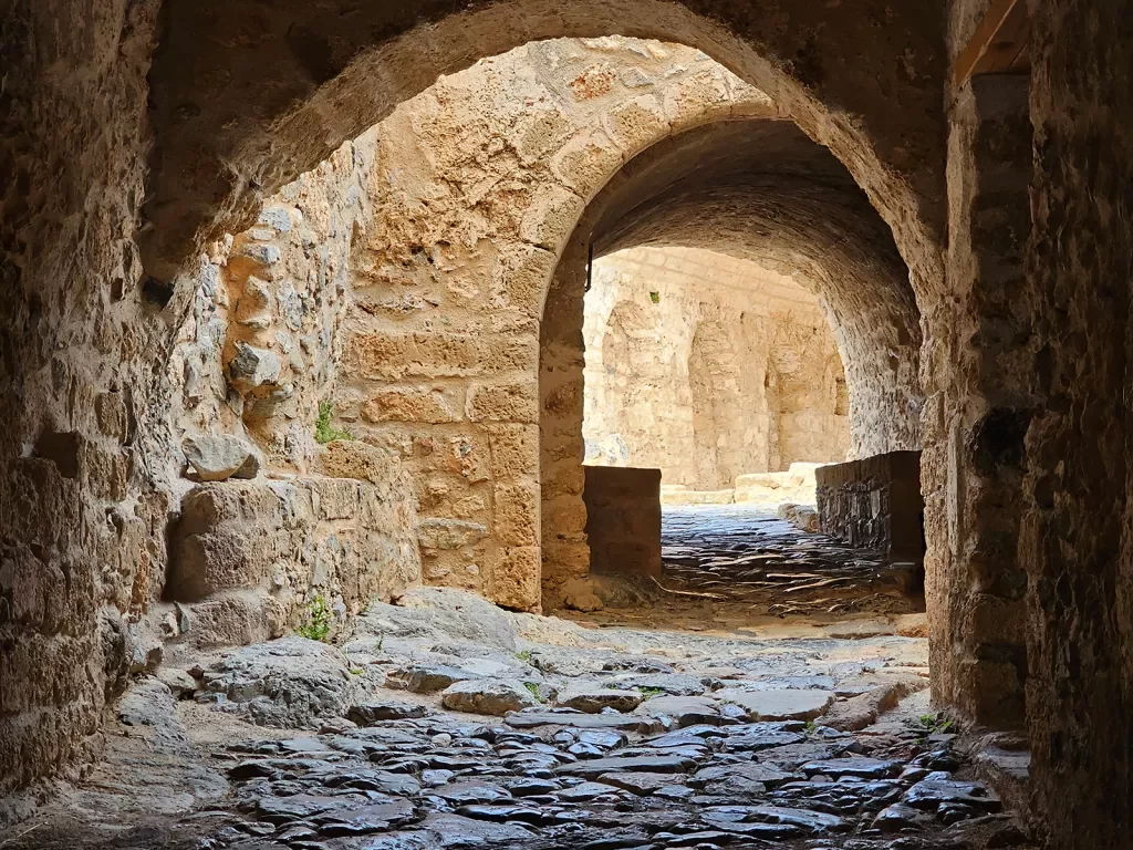 POV shot of ancient stone alleyways.