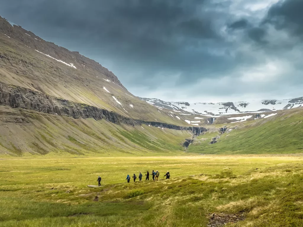 Group Hiking Valley Iceland