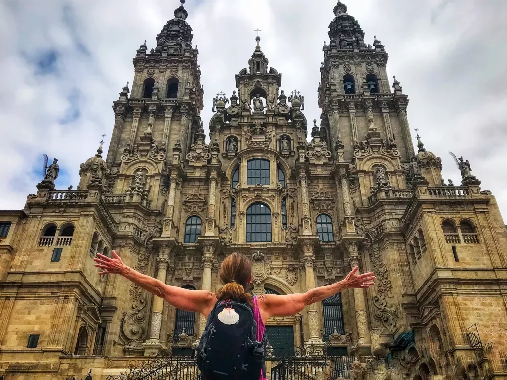 Woman enjoying the façade of the Cathedral of Santiago
