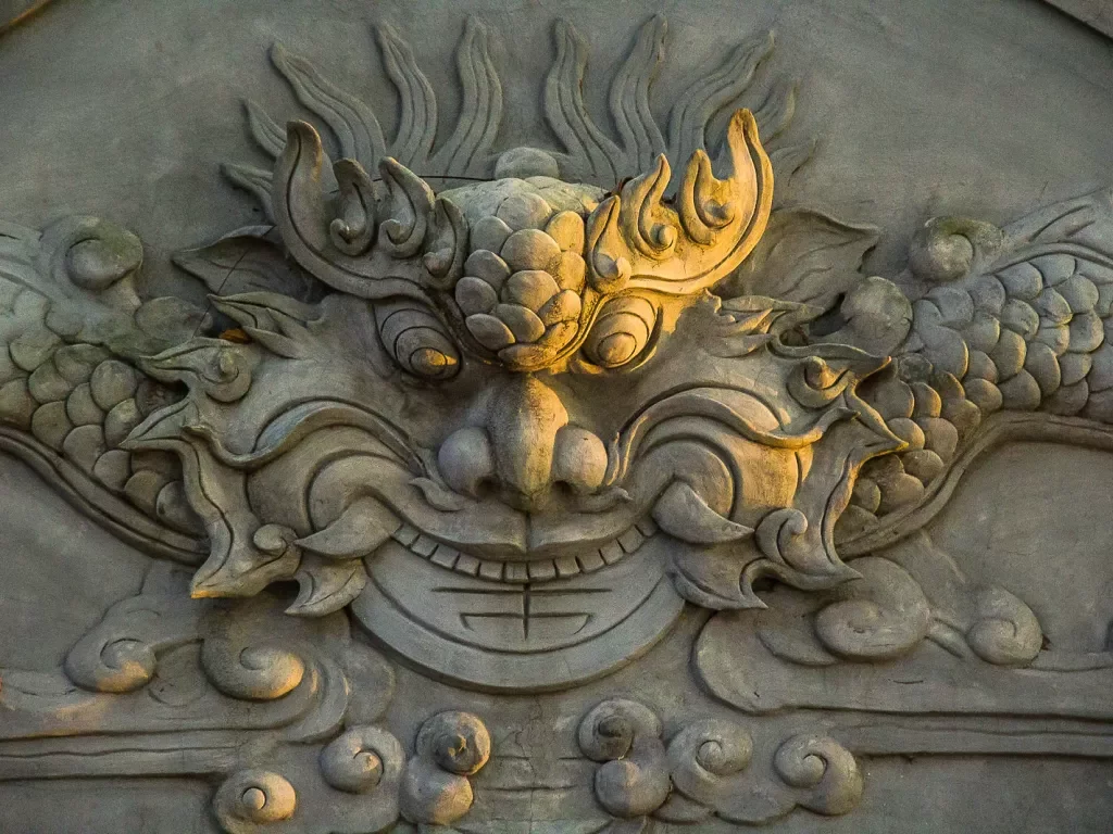 Ornate stone carving of a dragon