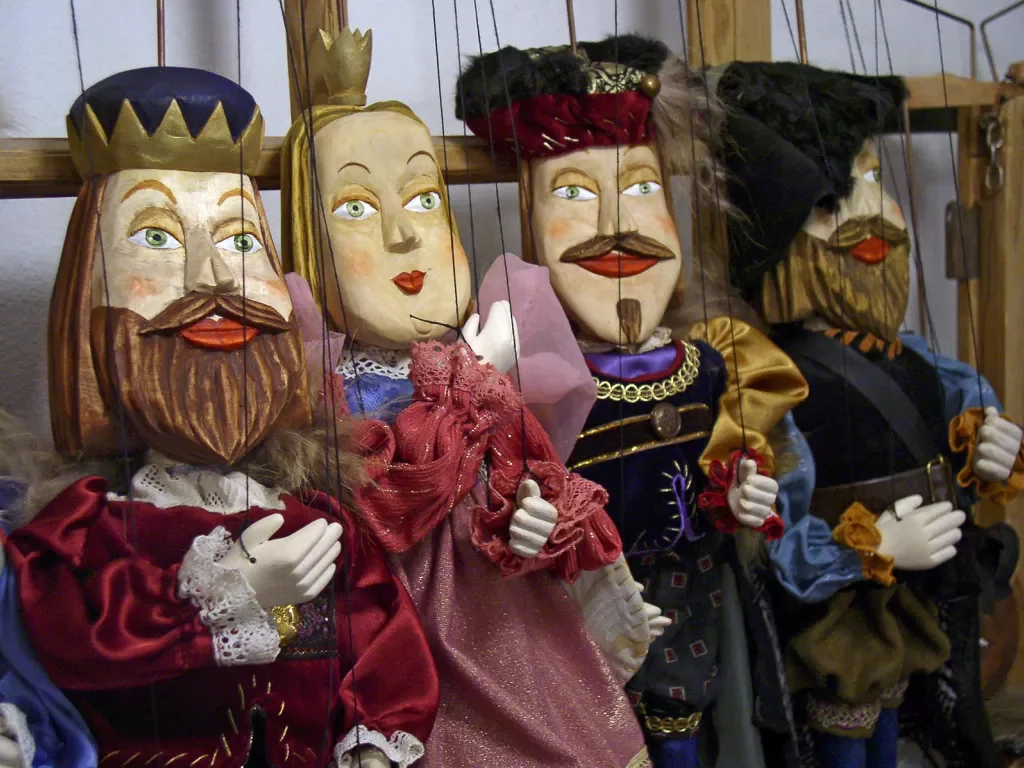 Four wooden puppets, Austria.