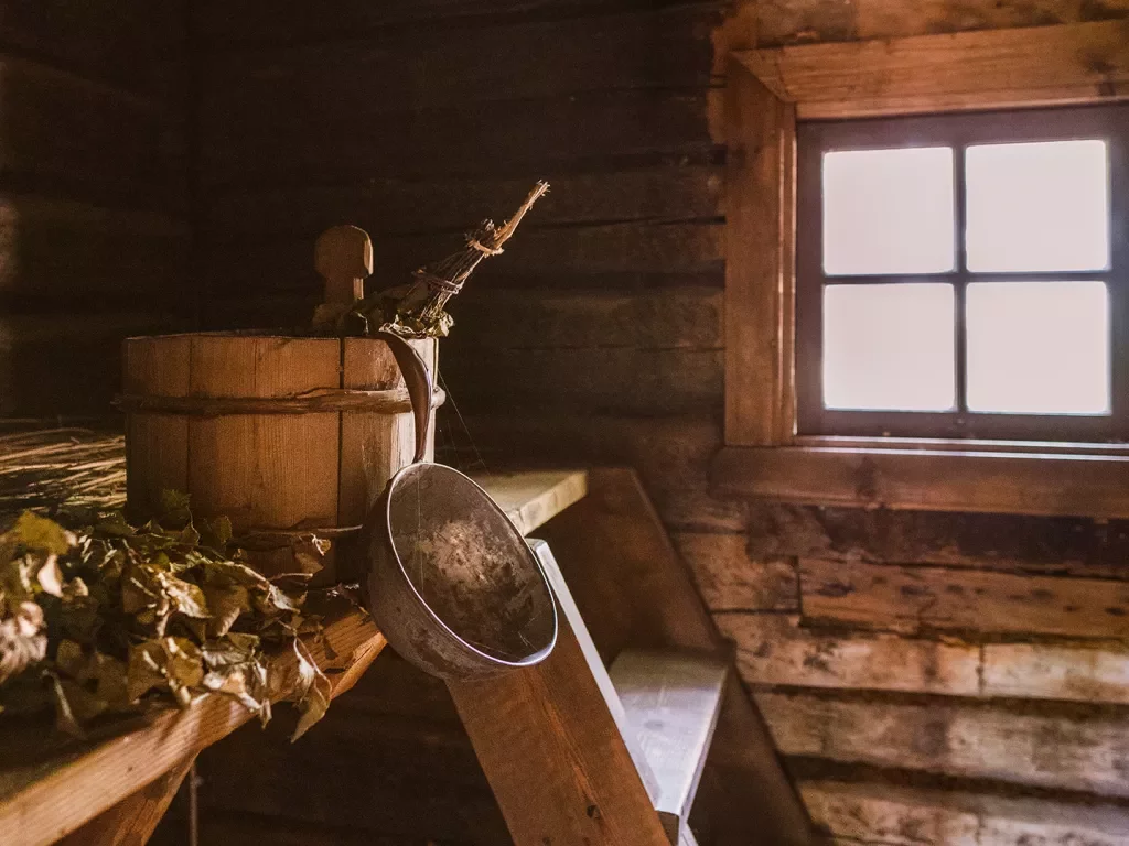 Wooden bucket in a wood cabin