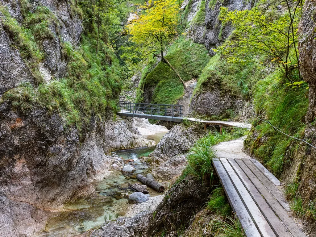 a winding bridge through mountains