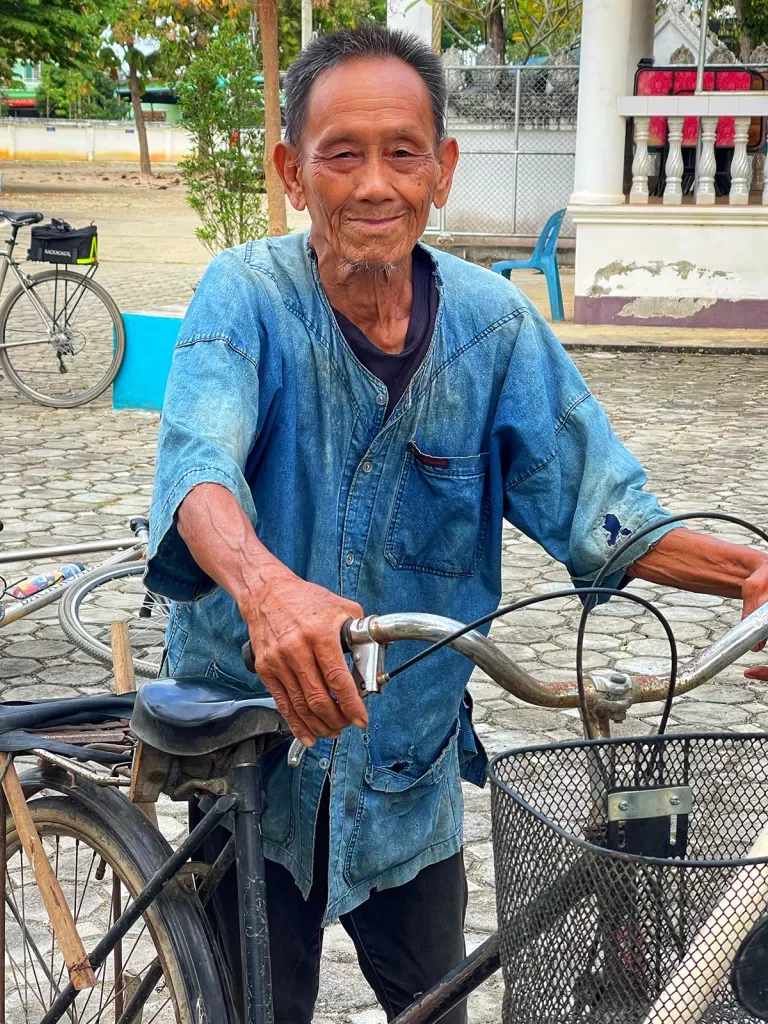 Local Thai man with a bike