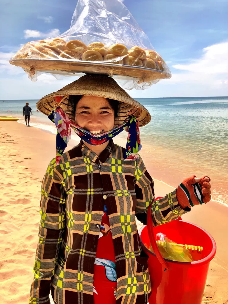 Local Vietnamese woman on the beach