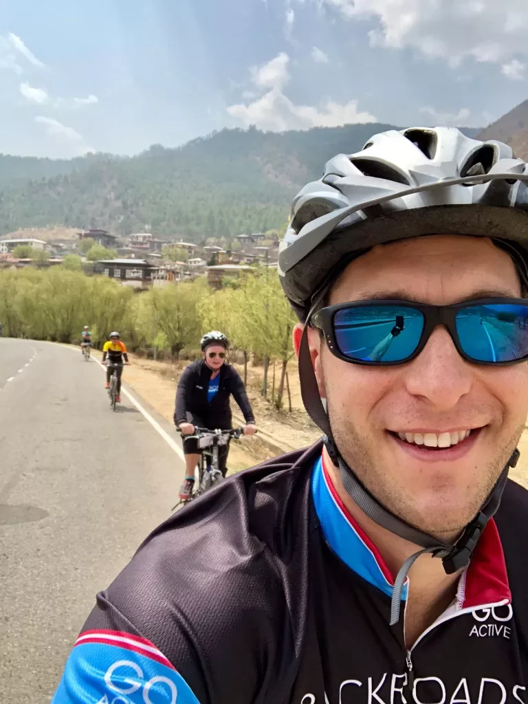 Bikers taking a selfie while riding in Bhutan