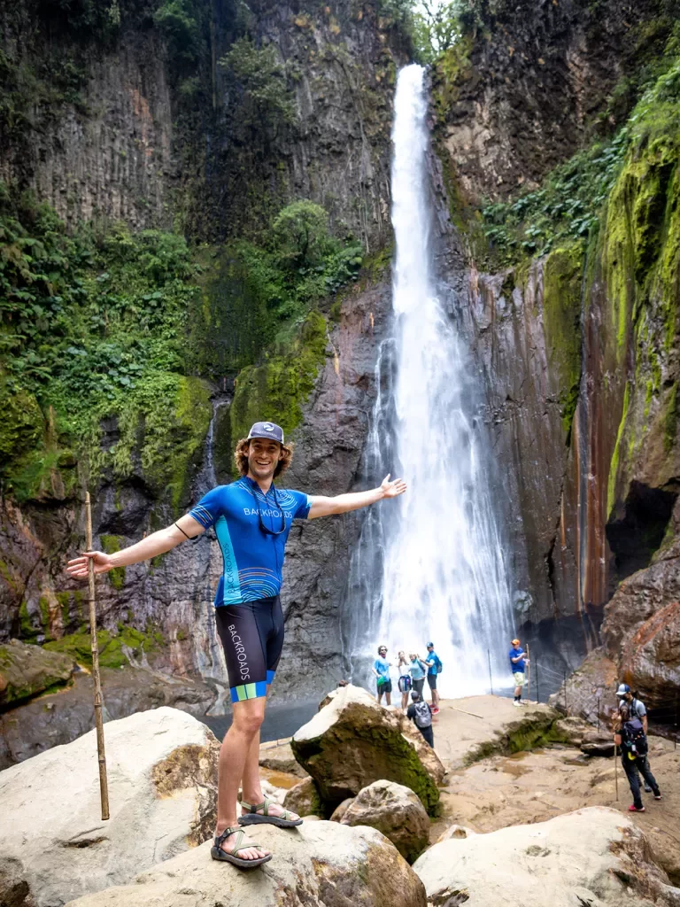 Leader Showcasing Large Waterfall Costa Rica