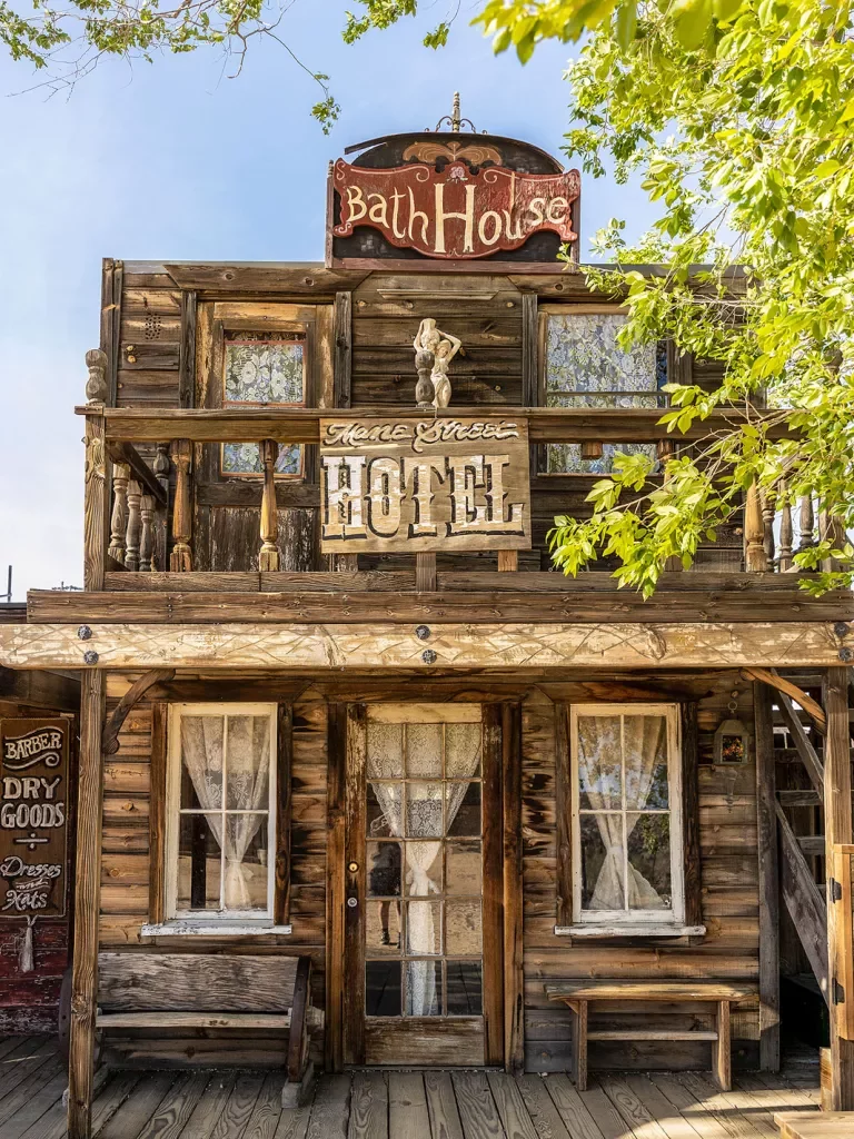 Storefront shot of the "MANE STREET HOTEL", old west style building.