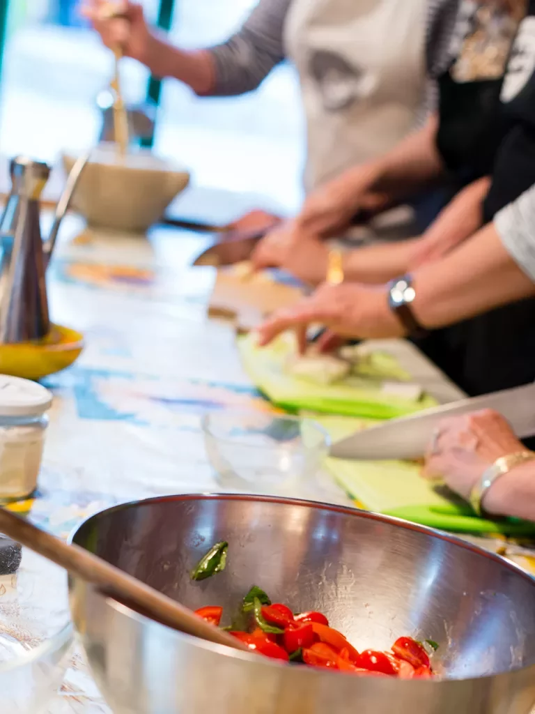 Close-up of guests at cooking class.