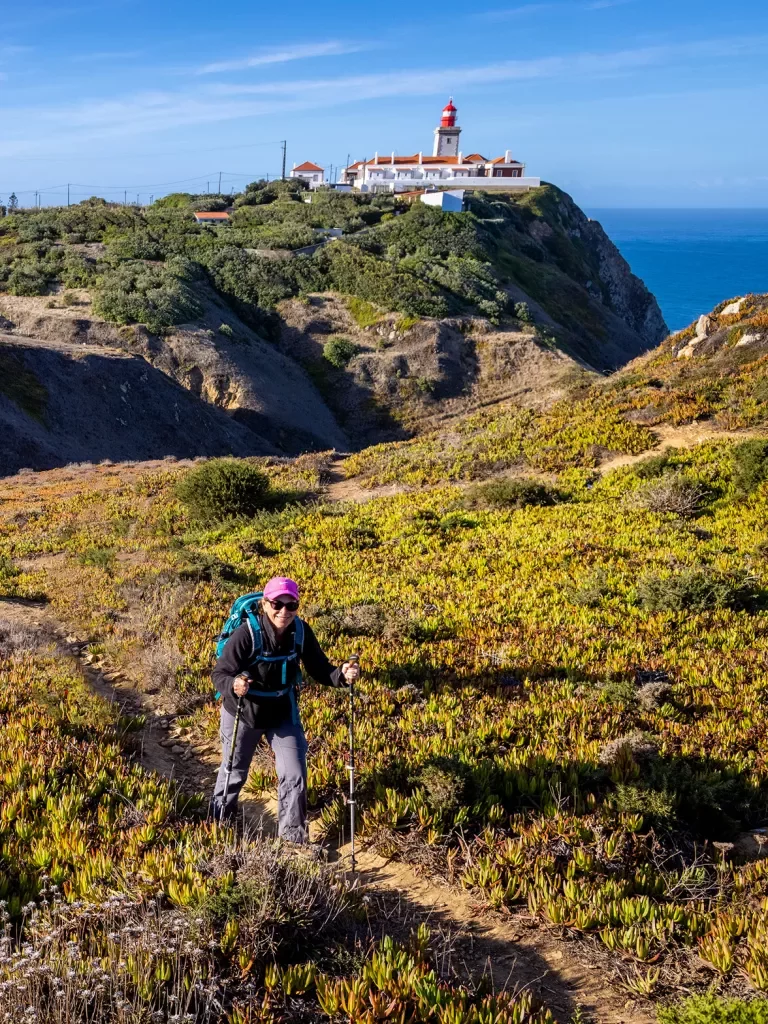 One woman hiking along cliffs 